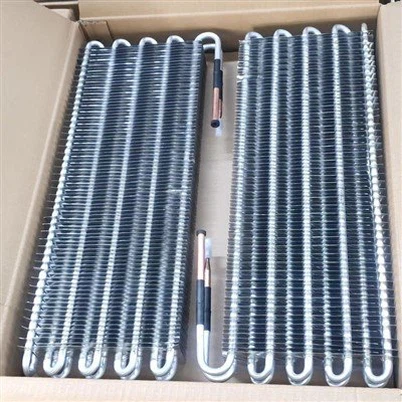 Fordamper med finnet aluminiumsrør